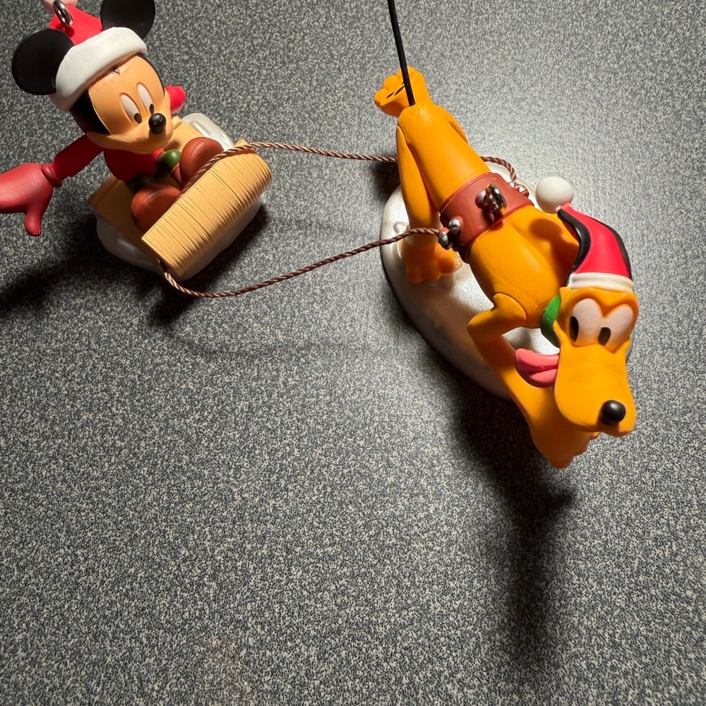 Hallmark ornaments Mickey and Pluto Holiday Sled